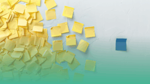 Blue sticky note among yellow notes symbolizing fairness and inclusion in the workplace