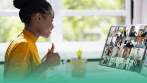 Professional woman attending a virtual business meeting with her team on a video call, symbolizing modern workplace collaboration.
